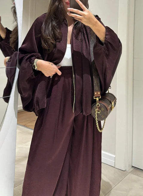 A two-piece set of casual zipper jacket and trousers