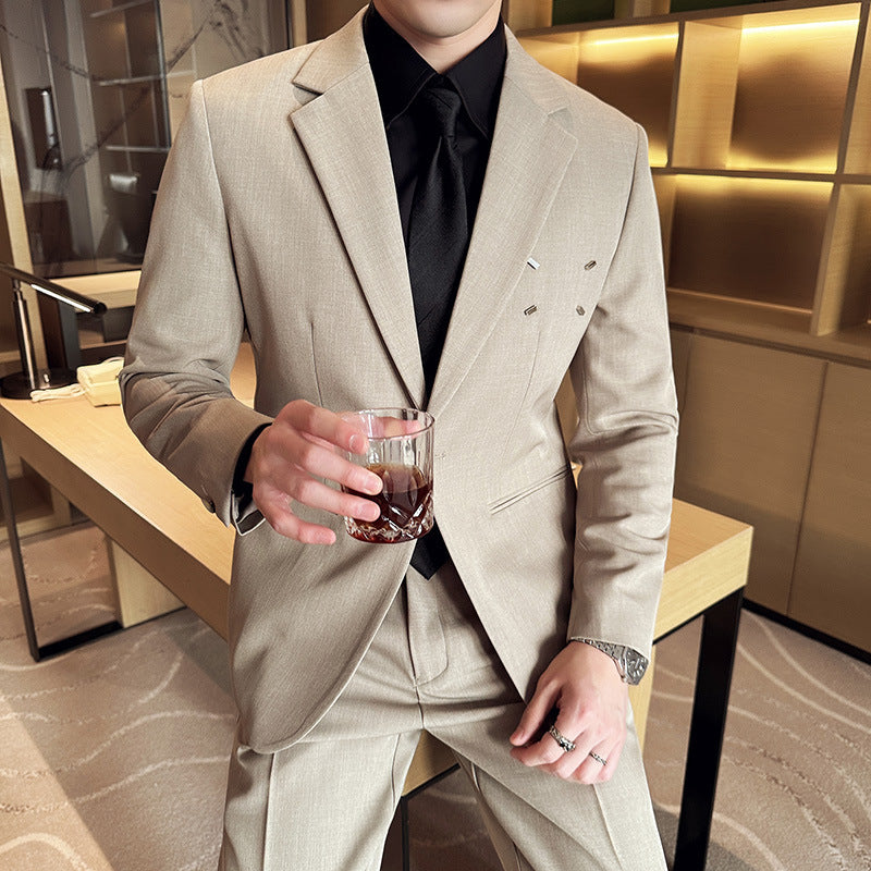 Slim-fit Thin One Button Casual Suit Jacket Men's worn by a man holding a drink in an elegant setting.