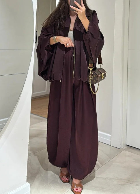 A two-piece set of casual zipper jacket and trousers