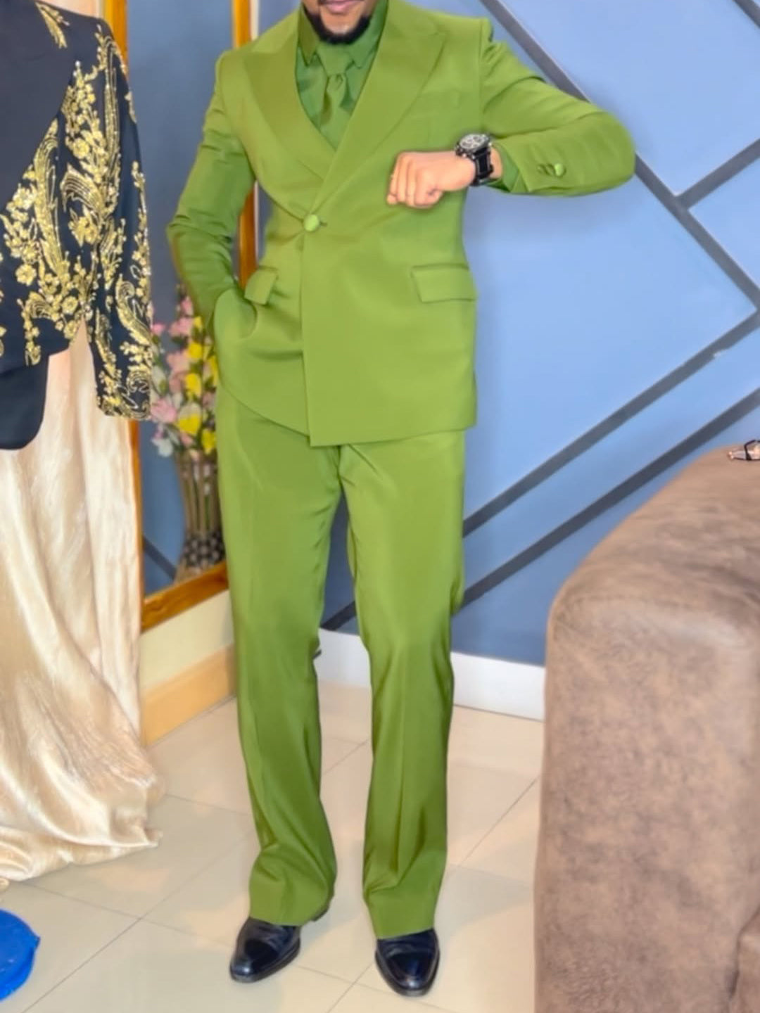 Olive- Green Three-Piece Suit Blaze&Shirt&Tie Ensemble worn by a man showcasing elegance and sophistication.