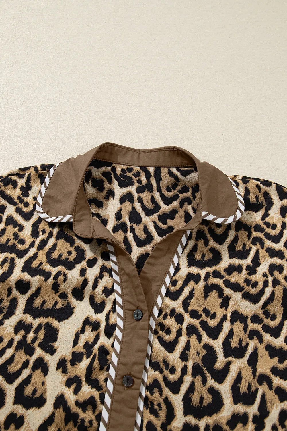 A Two-piece Suit Of Shirt And Slacks